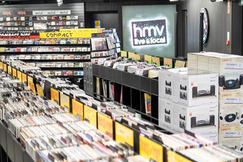 Interior of HMV store, Oxford Street, London showing CDs on display